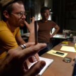 planning meeting; Billy, Steven, cigarette