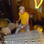 planning meeting; Billy plays drums and vibraphone